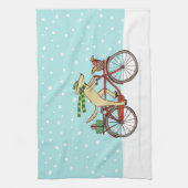 Een ronddraaiende fiets met kerstfeestdag theedoek (Verticaal)