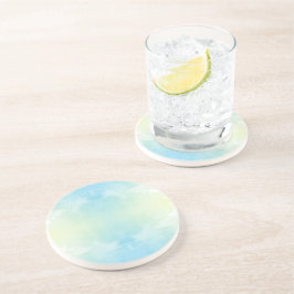 Een ronde plaat met een delicaat aquarelontwerp zandsteen onderzetter