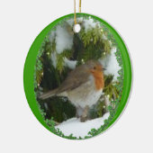 Een ronde Robin Kerstdecoratie Keramisch Ornament (Links)
