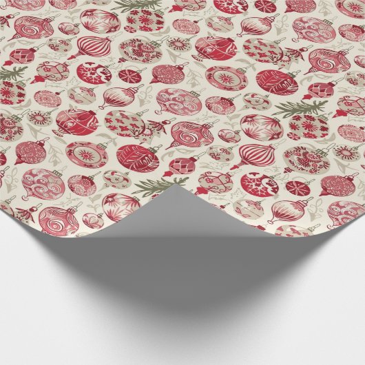 Een rood en crème kerstversiering patroon cadeaupapier (Hoek)