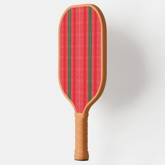 Een rood en groen gestreepte achtergrond pickleball paddle (Links)