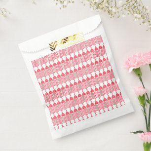 Een rood en roze geometrisch patroon met in elkaar bedankzakje