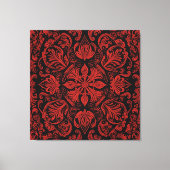 Een rood en zwart vierkant met florale design canvas afdruk (Voorkant)