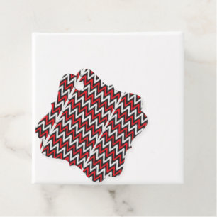 Een rood en zwart zigzagpatroon op een witte achte bedankjes labels