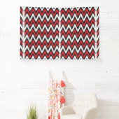 Een rood en zwart zigzagpatroon op een witte achte spandoek (Insitu)