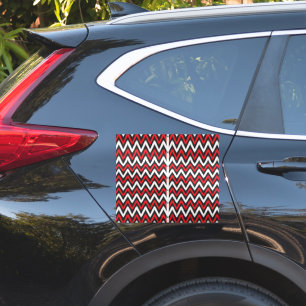 Een rood en zwart zigzagpatroon op een witte achte sticker