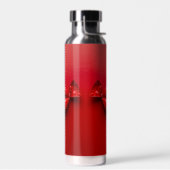 Een rood snoep waterfles (Links)