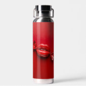 Een rood snoep waterfles (Achterkant)