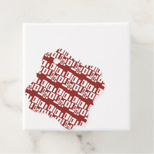 Een rood tapijt met een getextureerd patroon is ve bedankjes labels
