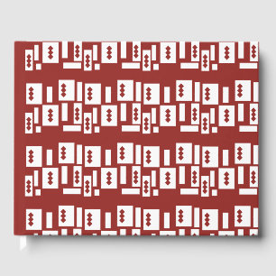 Een rood tapijt met een getextureerd patroon is ve gastenboek
