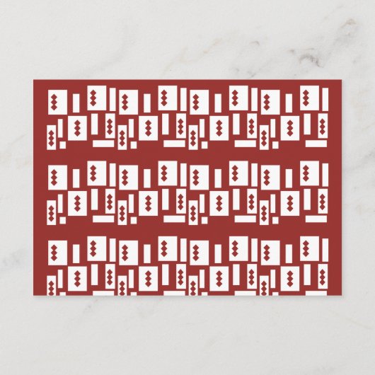 Een rood tapijt met een getextureerd patroon is ve informatiekaartje (Achterkant)