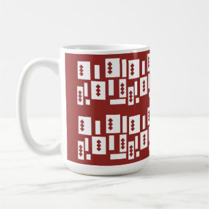 Een rood tapijt met een getextureerd patroon is ve koffiemok