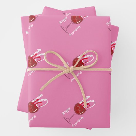 Een rood wijnglas met 2 ijs in hartvorm inpakpapier vel (In situ)