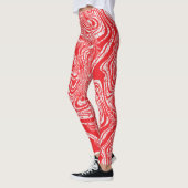 Een rood-wit afbeelding van een patroon op een wit leggings (Links)