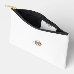 Een rood-wit bloemontwerp op een witte achtergrond etui