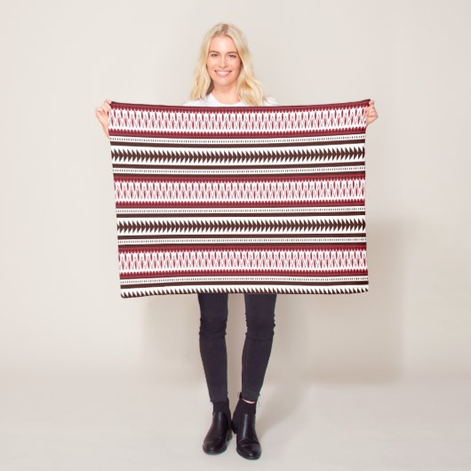 Een rood-wit gestreept patroon fleece deken (In situ)