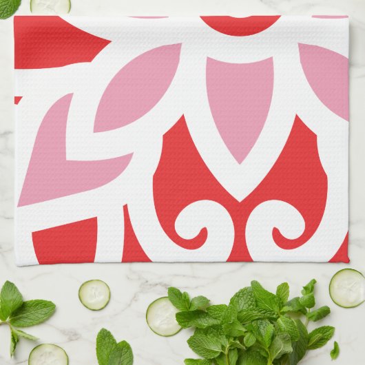 Een rood-wit patroon met een bloem erop theedoek (Gevouwen)