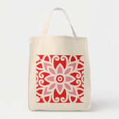 Een rood-wit patroon met een bloem erop tote bag (Voorkant)