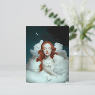 Een roodharige vrouw die een kat in de wolken houd briefkaart