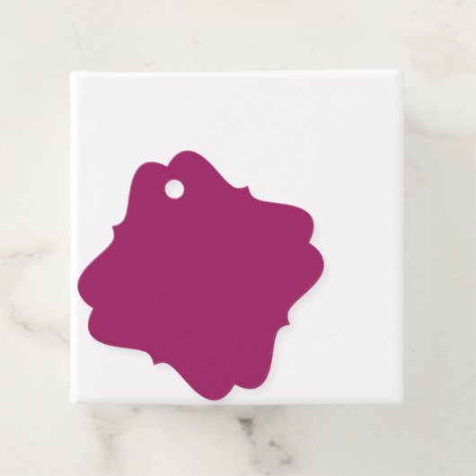Een roze achtergrond met een witte achtergrond bedankjes labels (In situ)