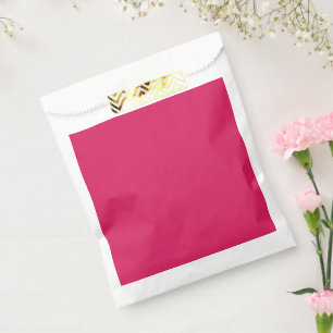 Een roze achtergrond met een witte rand bedankzakje