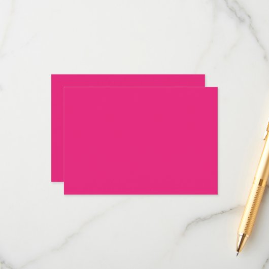 Een roze achtergrond met een zwarte achtergrond informatiekaartje (Voorkant / Achterkant in situ)