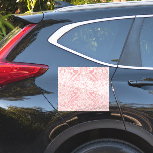Een roze en wit abstract ontwerp op een witte acht sticker