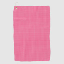 Een roze handdoek met een subtiel rasterpatroon