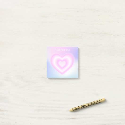 Een roze Neon Hartvorm Post-it® Notes (Op bureau)