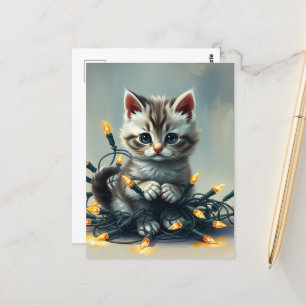 Een schattig kitten verpakt in kerstverlichting briefkaart