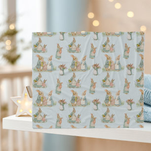 een schattig konijnengezin met een baby fleece deken
