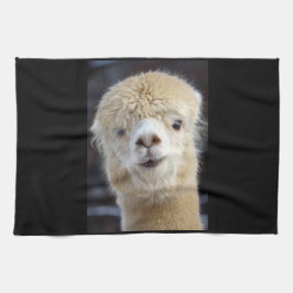 Een schattig pluizig gezicht van een alpaca        theedoek