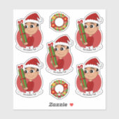 Een schattige peuter met een kerstcadeau sticker (Vel)