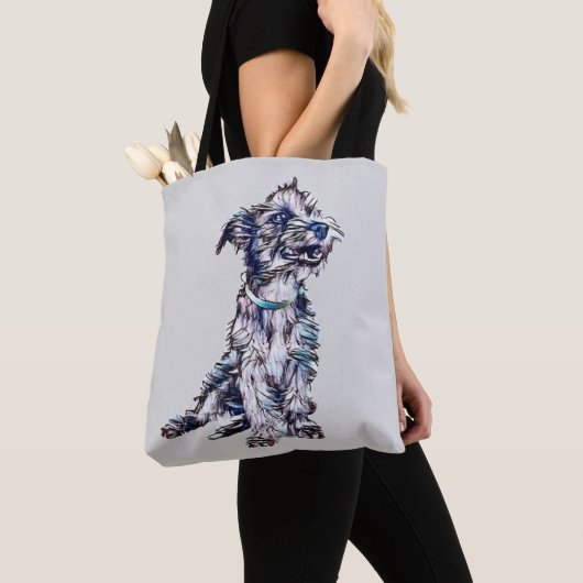 Een schattige, saaie, gemengde kruidhond met een g tote bag (Dichtbij)