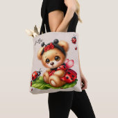 Een Schattigee teddybeer verkleed als een lievehee Tote Bag (Dichtbij)