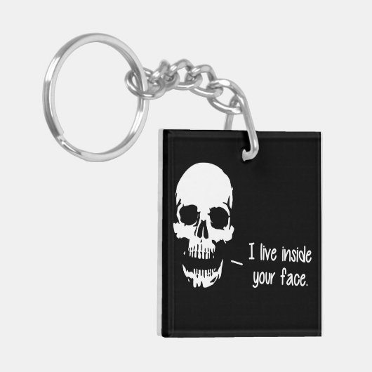 Een schedel leeft in je gezicht sleutelhanger (Voorkant Links)