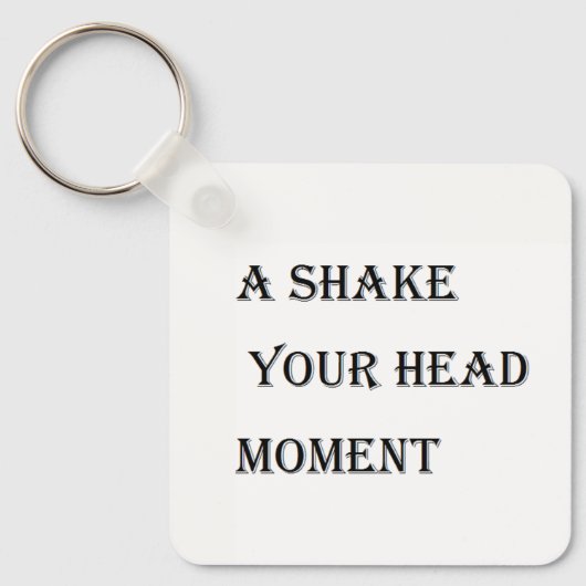 Een schud je hoofd momenten sleutelhanger (Voorkant)