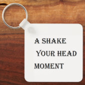 Een schud je hoofd momenten sleutelhanger (Voorkant)