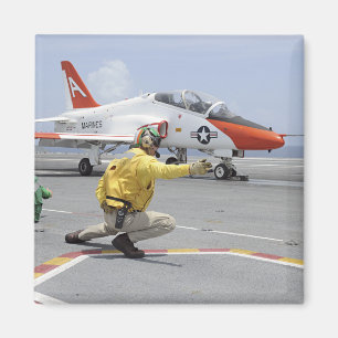 Een schutter aan boord van de vliegtuig vervoerder magneet