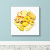 Een selectie van gele groenten en fruit. canvas afdruk (Insitu (Houten vloer))