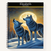 Een serene wolf huilt bij het stralende maanlicht notitieboek (Voorkant)
