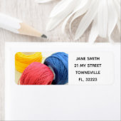 Een set retourlabels met een naaithema etiket (Insitu)