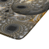 Een sferisch ballet in zilver en goud snijplank (Hoek)