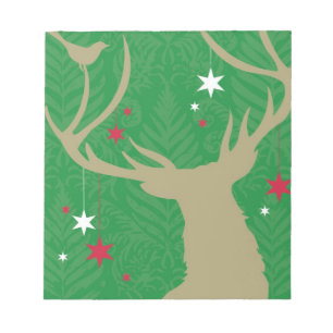 Een silhouet van een hert met sterren die uit zijn notitieblok