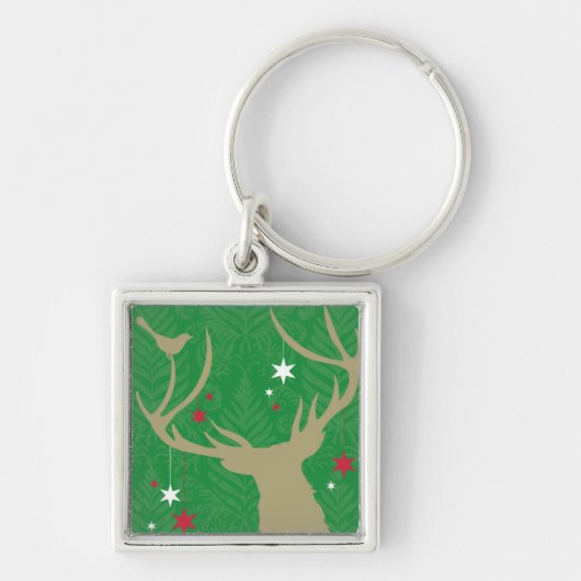 Een silhouet van een hert met sterren die uit zijn sleutelhanger (Voorkant)