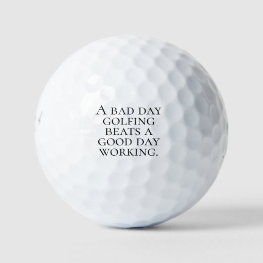 "Een slechte dag golfen is beter dan een goede dag Golfballen (Voorkant)