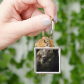 Een slopende hond sleutelhanger (Hand)