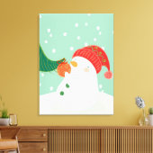 Een sneeuwman die een ornament aan een boom hangt canvas afdruk (Insitu (Woonkamer))