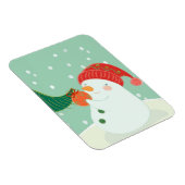 Een sneeuwman die een ornament aan een boom hangt magneet (Rechterzijde)