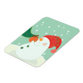 Een sneeuwman die een ornament aan een boom hangt magneet (Linkerzijde)